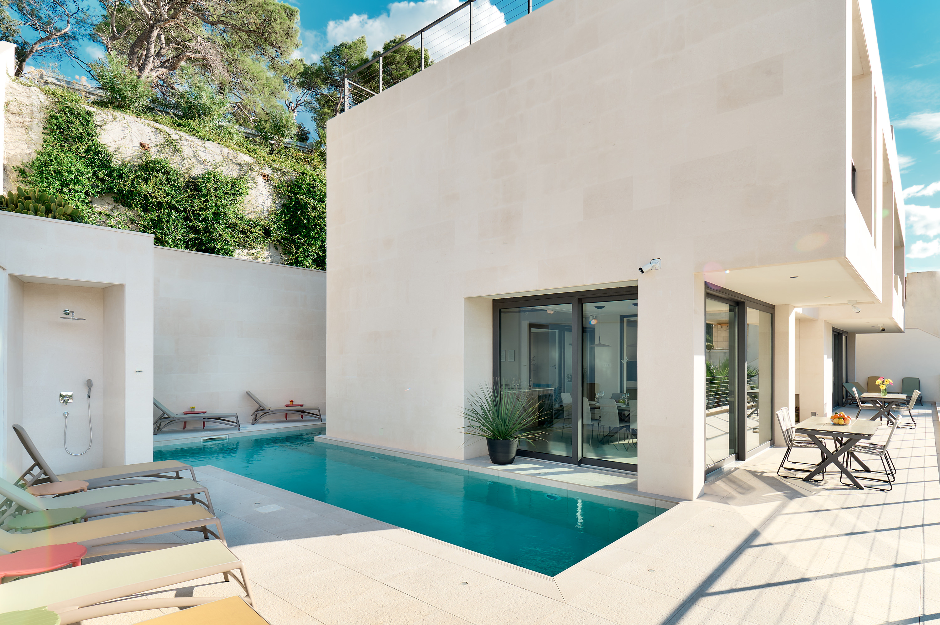 Top-down view showing the L-shaped pool